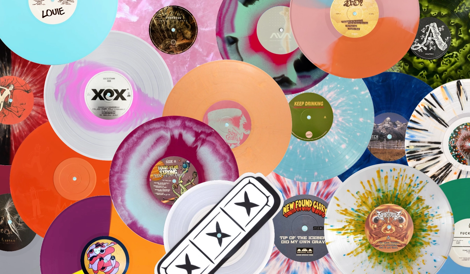 A collage of coloured vinyl records